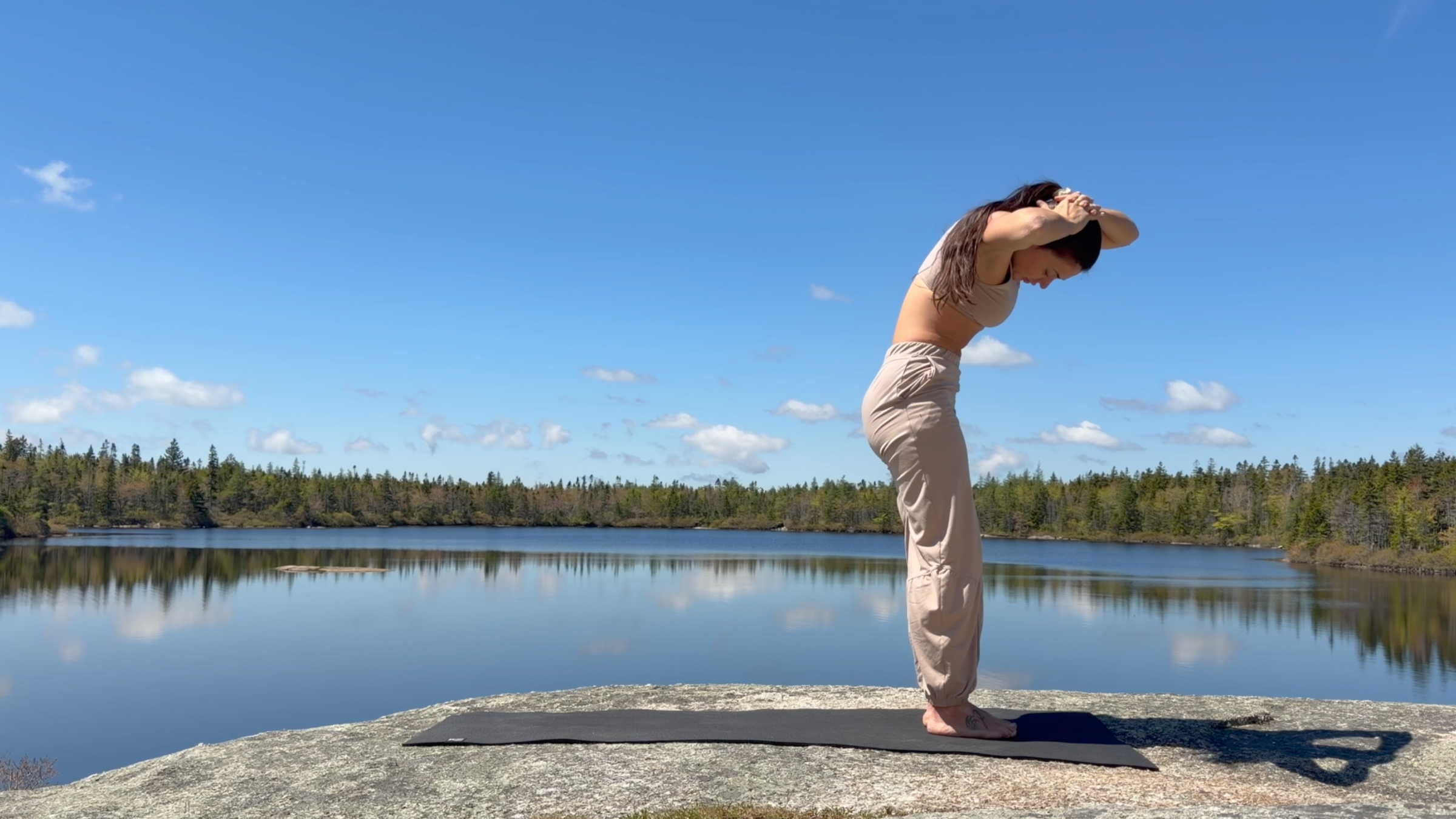 Yoga teacher Emily Baltzer doing Spine Circles